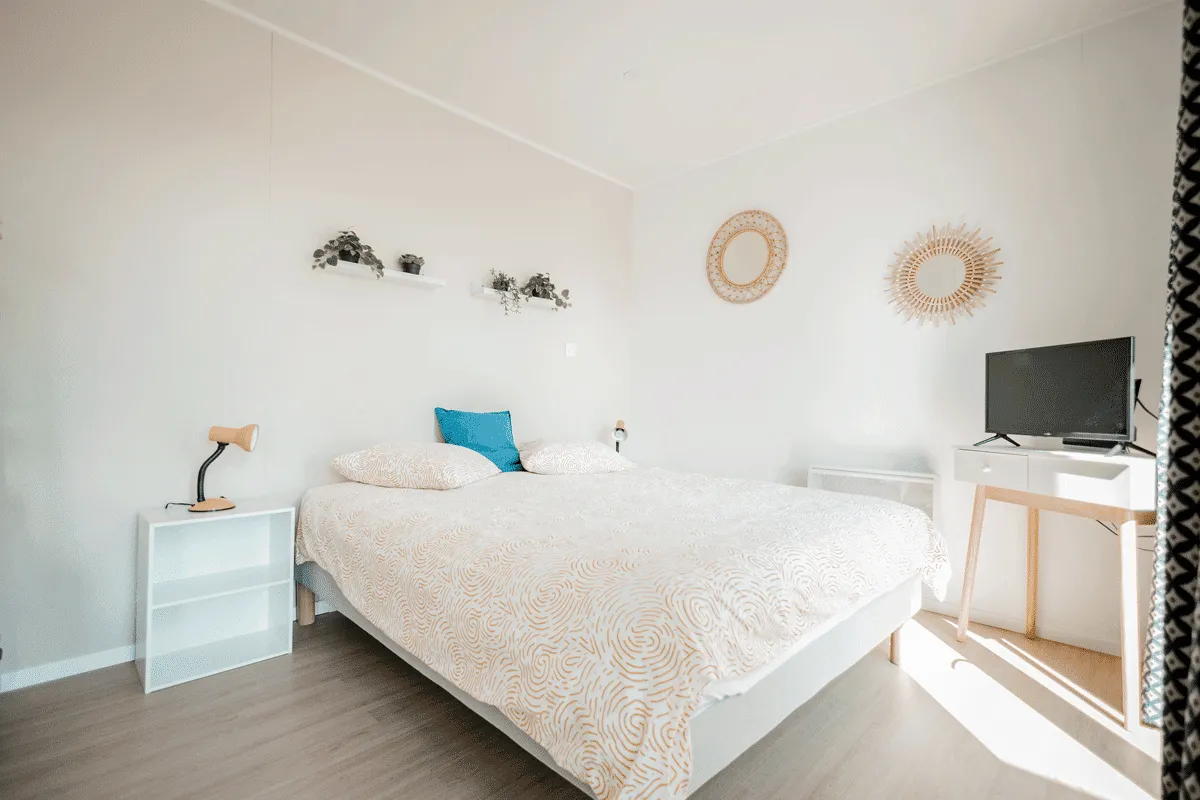 Chambre d’amis dans une maison en bois